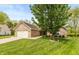 Charming brick home with a well-manicured lawn and a two-car garage, located in a friendly neighborhood at 35 Valley View, Brownsburg, IN 46112