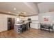 Modern kitchen featuring stainless steel appliances, granite countertops, and a center island at 35 Valley View, Brownsburg, IN 46112