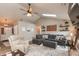 Spacious living room with a sectional sofa, vaulted ceiling, and natural light at 35 Valley View, Brownsburg, IN 46112