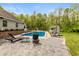 Enjoy this backyard pool complete with patio area, lounge chairs, and a shed for pool-side convenience at 35 Valley View, Brownsburg, IN 46112