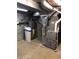 Basement mechanical area featuring hot water heater, water softener and HVAC systems at 3619 31St St, Columbus, IN 47203