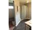 Bathroom with shower and blue tiled walls at 3619 31St St, Columbus, IN 47203