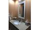 Well-lit bathroom featuring vanity with a granite countertop, ample storage, and clean finishes at 3619 31St St, Columbus, IN 47203
