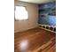 Bright bedroom with wood floors and a scenic mural at 3619 31St St, Columbus, IN 47203