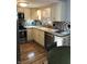 Kitchen showcasing stainless steel appliances, ample counter space, and stylish mosaic backsplash at 3619 31St St, Columbus, IN 47203