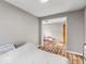 Comfortable bedroom with hardwood flooring and an attached room for Bedroom or play at 3868 E Worthsville Rd, Whiteland, IN 46184