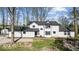 Charming two-story home featuring a well-manicured lawn and inviting curb appeal at 3868 E Worthsville Rd, Whiteland, IN 46184