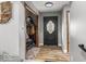 Hallway features a closet with clothes storage and a decorative front door at 3868 E Worthsville Rd, Whiteland, IN 46184
