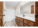 Bathroom features a single sink vanity, toilet, and shower-tub combo at 40 Clear Spring Ln, Trafalgar, IN 46181