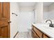 Bathroom features a single sink vanity, toilet, and shower-tub combo at 40 Clear Spring Ln, Trafalgar, IN 46181