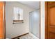 Bathroom with window and shower separated from vanity and toilet area at 40 Clear Spring Ln, Trafalgar, IN 46181