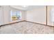 Bright bedroom featuring tile floors, large windows, and a view of the outdoors at 40 Clear Spring Ln, Trafalgar, IN 46181