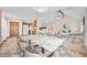 Open concept dining room with neutral carpet and vaulted ceiling seamlessly connects to kitchen and living spaces at 40 Clear Spring Ln, Trafalgar, IN 46181