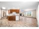 Open kitchen with wood cabinets, ample counter space, and stainless steel appliances at 40 Clear Spring Ln, Trafalgar, IN 46181