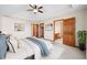 Comfortable main bedroom has ensuite bathroom and view of closet and bathroom at 40 Clear Spring Ln, Trafalgar, IN 46181
