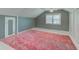 Bedroom featuring a large rug and window with natural light at 42 E Brookville Rd, Fountaintown, IN 46130