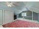 Bedroom featuring a fireplace, two closets, and a window at 42 E Brookville Rd, Fountaintown, IN 46130