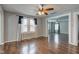 Inviting living room featuring hardwood floors, neutral paint and a sun-drenched window at 42 E Brookville Rd, Fountaintown, IN 46130