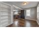 Living room with a view into the kitchen, highlighting an open layout at 42 E Brookville Rd, Fountaintown, IN 46130