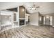 Bright and spacious living room with vaulted ceiling, fireplace, built-ins, and an open floor plan at 51 Glasgow Ln, Noblesville, IN 46060