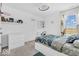 Bedroom showcasing a bright window view, decoratively adorned walls, and a well-styled bed at 5256 Bramwell Ln, Whitestown, IN 46075