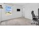 Bedroom featuring neutral decor, an office setup, a wall mounted tv, and a window view at 5256 Bramwell Ln, Whitestown, IN 46075