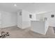 Upstairs loft with neutral carpet, bright walls, and ample natural light from a window, creating a versatile space at 5256 Bramwell Ln, Whitestown, IN 46075