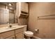 Bathroom featuring a vanity, toilet, and a glass door shower at 5356 S U.S. Highway 421, Zionsville, IN 46077