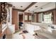 Well-lit bathroom with dual sink vanity, floral valances, and decorative accents at 5356 S U.S. Highway 421, Zionsville, IN 46077