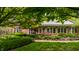 Exterior featuring brick, lush landscaping and a walkway at 5356 S U.S. Highway 421, Zionsville, IN 46077