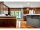 Updated kitchen featuring custom cabinets, stainless steel appliances, an island, and a breakfast bar at 5356 S U.S. Highway 421, Zionsville, IN 46077