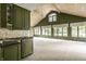 Unique room with vaulted wood ceilings, built-in cabinets, and an abundance of windows that flood the space with light at 5356 S U.S. Highway 421, Zionsville, IN 46077