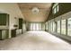Unique room with vaulted wood ceilings, built-in cabinets, and an abundance of windows that flood the space with light at 5356 S U.S. Highway 421, Zionsville, IN 46077