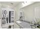 Bathroom featuring granite counters and decorative shower curtain at 5366 Laurel Crest Run, Noblesville, IN 46062