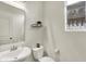 Chic half bathroom featuring a pedestal sink, toilet, and modern decor creating a cozy space at 5366 Laurel Crest Run, Noblesville, IN 46062