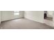 Empty bedroom featuring neutral walls, carpet and a window at 5366 Laurel Crest Run, Noblesville, IN 46062
