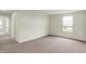 Empty bedroom featuring neutral walls, carpet and a window at 5366 Laurel Crest Run, Noblesville, IN 46062