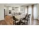 Bright kitchen features white cabinets, stainless steel appliances, and an island for meal prep at 5366 Laurel Crest Run, Noblesville, IN 46062
