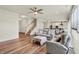 Spacious living room with hardwood floors, staircase, and ample natural light at 5366 Laurel Crest Run, Noblesville, IN 46062