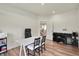 Office with wood floors and room for a desk, piano, and bookshelf at 5366 Laurel Crest Run, Noblesville, IN 46062