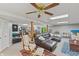 Spacious finished basement area with comfortable seating, a games area, and ample space for recreation and relaxation at 5920 Crooked Creek E Dr, Martinsville, IN 46151