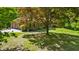 Charming brick home with a two-car garage, lush landscaping, and beautiful curb appeal at 5920 Crooked Creek E Dr, Martinsville, IN 46151