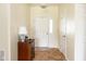 Bright entryway featuring neutral paint, and a stylish accent table with decor at 5957 Haywood Ct, Greenwood, IN 46142