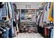 Organized walk-in closet with clothing racks, shelves, and shoe storage at 5958 Cape Cod Ct, Indianapolis, IN 46250