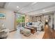 Living room offers wood floors, a cozy sofa, and built-in shelving, with a sliding door, for an inviting interior at 5958 Cape Cod Ct, Indianapolis, IN 46250