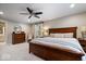Bright main bedroom featuring a ceiling fan, natural light, and and nightstands at 5958 Cape Cod Ct, Indianapolis, IN 46250
