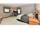 Neutral bedroom features a desk, dual windows, and a zebra-striped lamp at 5979 E Oak Hl Dr, Plainfield, IN 46168