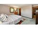 Bedroom features natural light from a window, a dresser, and neutral-colored walls at 5979 E Oak Hl Dr, Plainfield, IN 46168