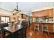 Eat-in kitchen and dining area with direct access to the living room and kitchen spaces at 5979 E Oak Hl Dr, Plainfield, IN 46168