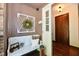 Inviting entryway with a decorative wreath, bench, and view into the home at 5979 E Oak Hl Dr, Plainfield, IN 46168